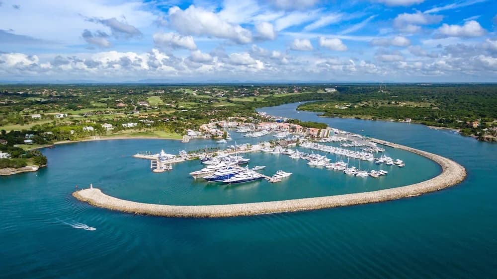 Luxury marina at Casa de Campo with tropical backdrop